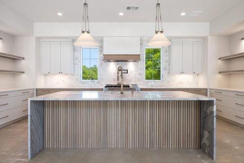 Modern kitchen with ribbed island